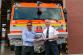 Joint photo in front of fire truck